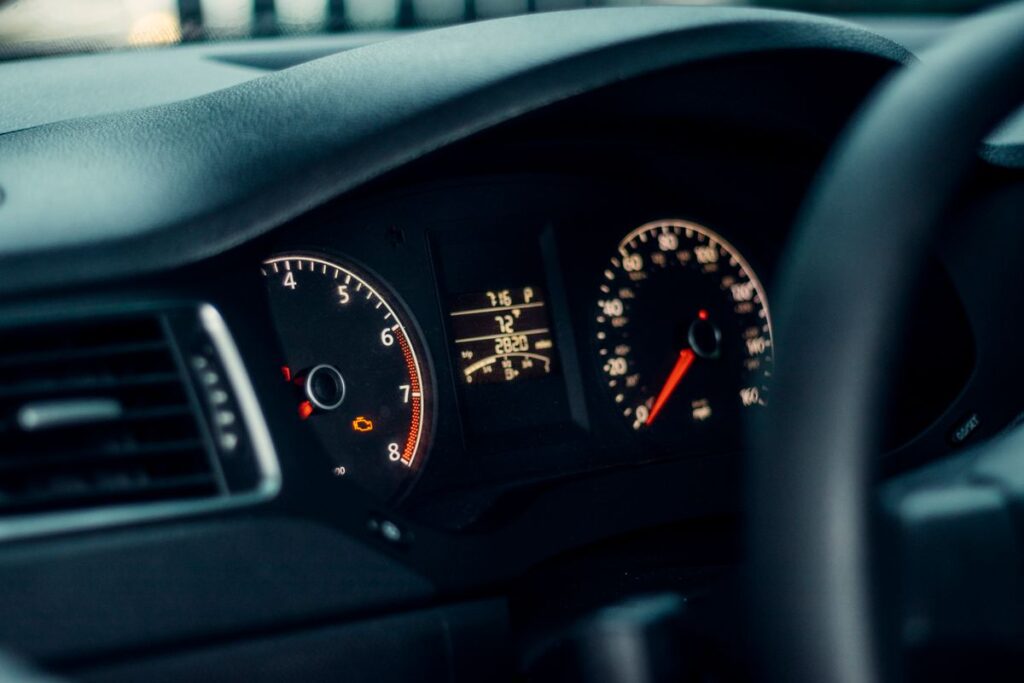 Instrument cluster with the temperature gauge and tachometer
