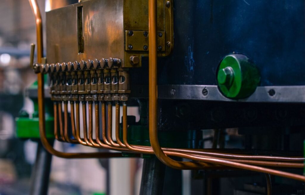 Copper tubing and steel fittings on machinery