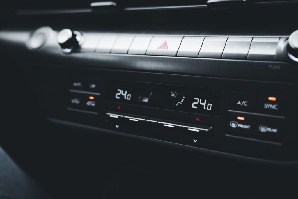 Climate control panel with rear defrost button