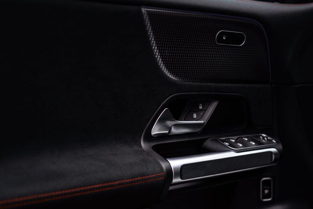 Door panel with handle and lock controls