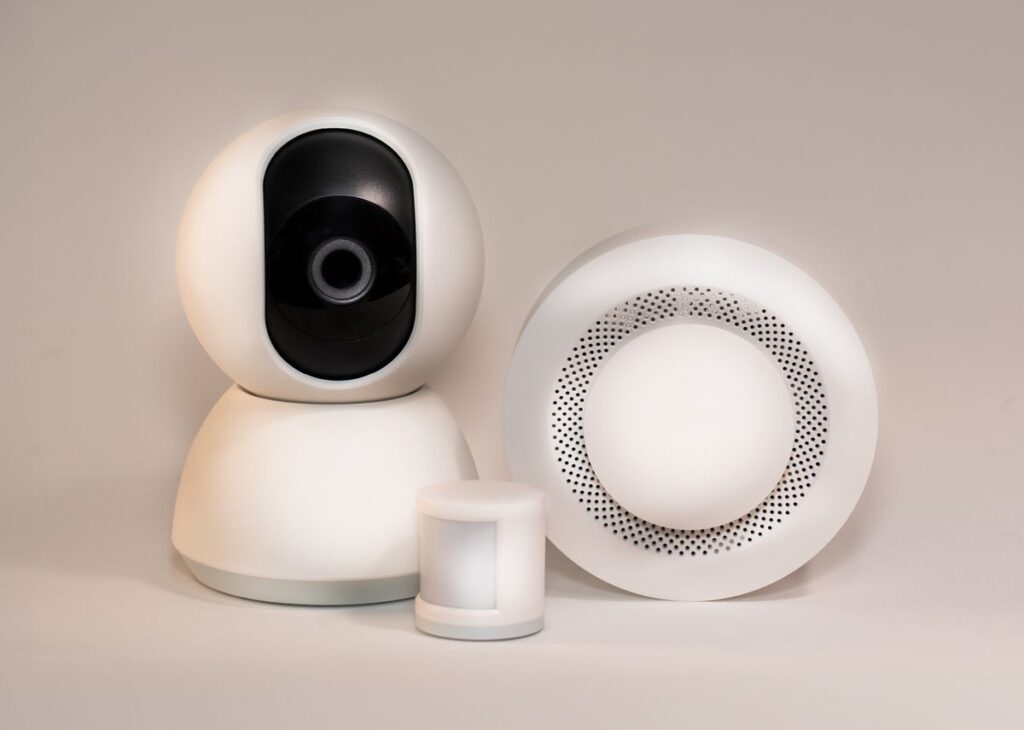 Home safety devices including a camera and sensors
