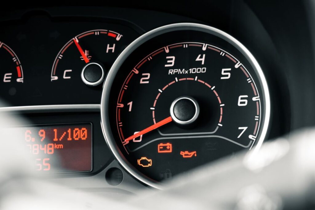 Tachometer with warning lights lit