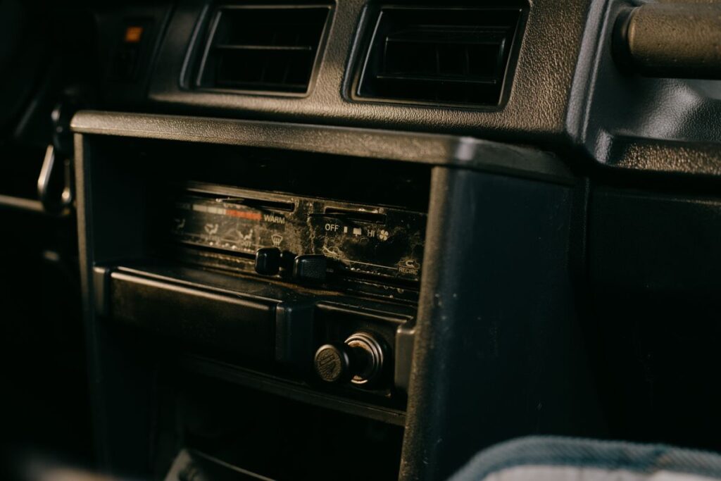Dashboard vents and an old radio
